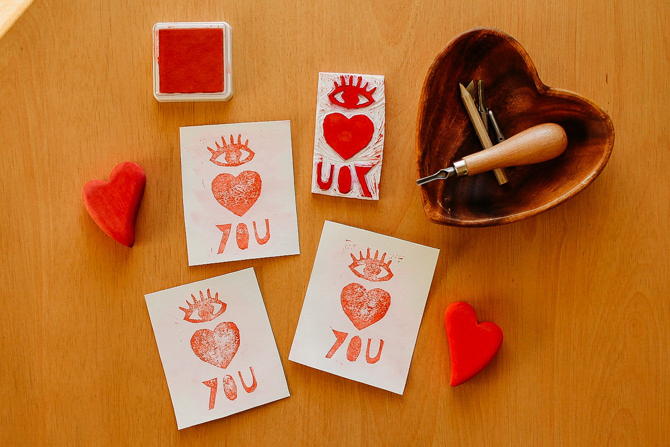 Valentine's Day cards sit on a table.