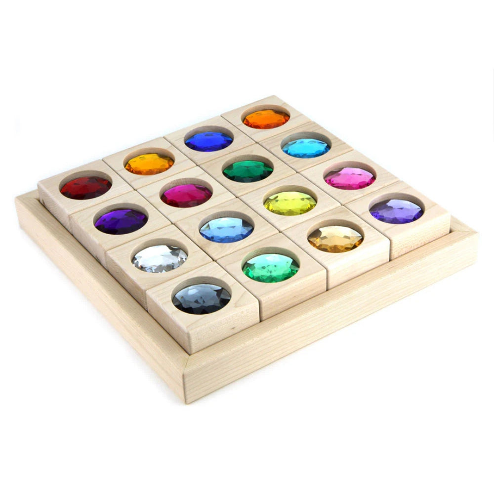 Wooden tray with 16 solid maple blocks, each featuring a large, colorful acrylic gem inset on top.