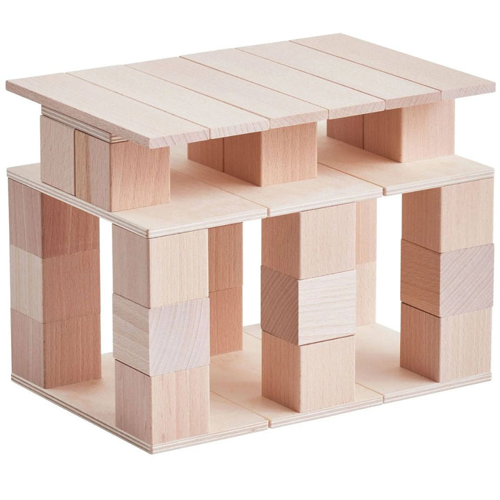 HABA Clever Up! Unit Wooden Block Building System 1.0 blocks stacked into a pyramid.