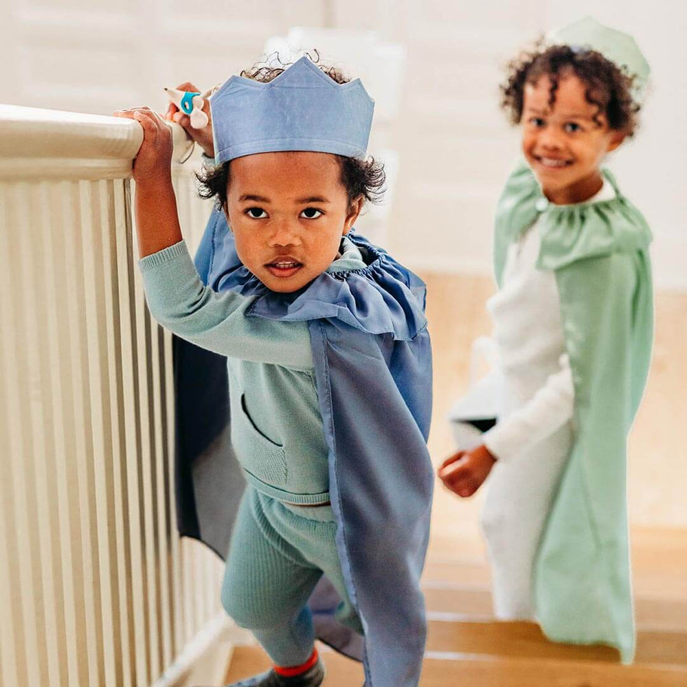 Child wearing Sarah's Silks Northern Coast Playsilk crown and cape