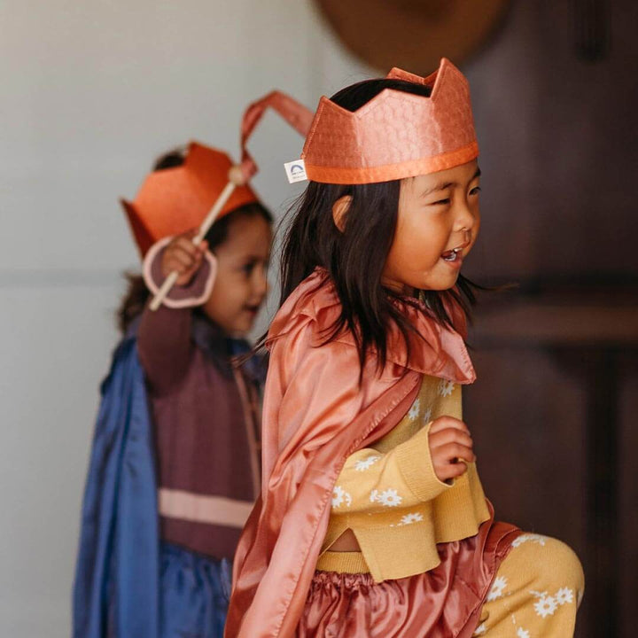 Child wearing Sarah's Silks Northern Coast Playsilk crown and cape