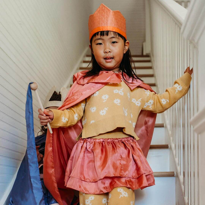 Child wearing Sarah's Silks Northern Playsilks cape and tutu in rosehip