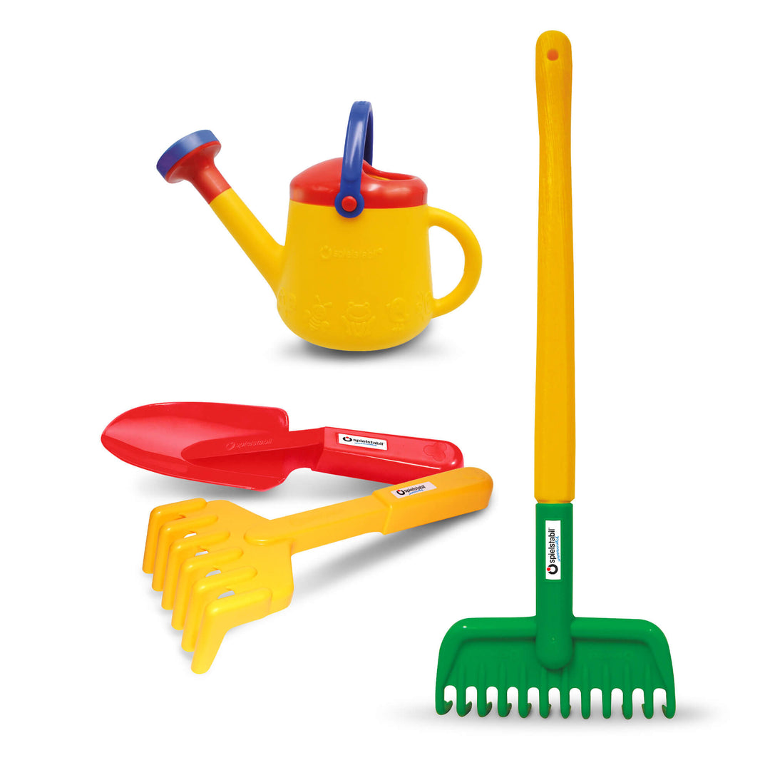 Spielstabil My First Gardening Tool Bundle with yellow watering can, red spade, yellow hand rake, and green and yellow long handled garden rake