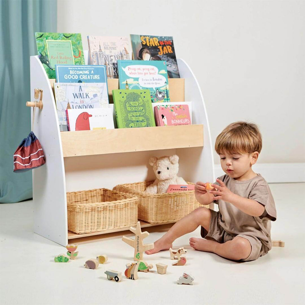 Tender Leaf Toys Forest Collection Wooden Book Shelf and Storage Unit filled with books and wooden toys