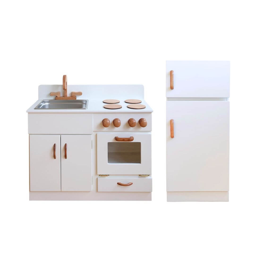 Children's play kitchen set with white cabinets, stove, and refrigerator on a white background