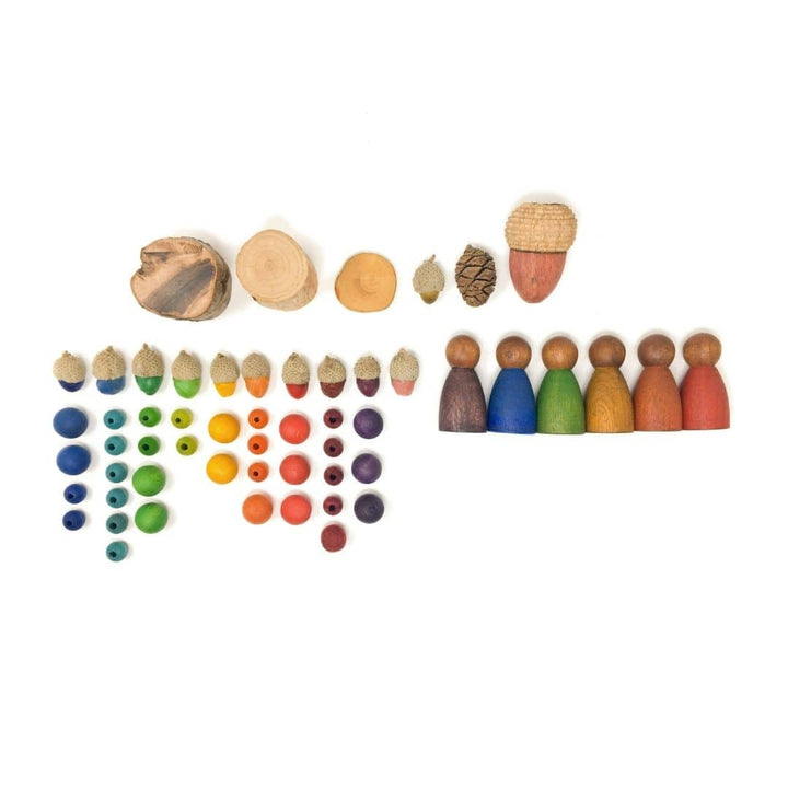 As an assortment of wooden items from Grapat, including their 6 Dark Nins peg people, 3 of which are the so-called Cold Nins: purple, blue, and green