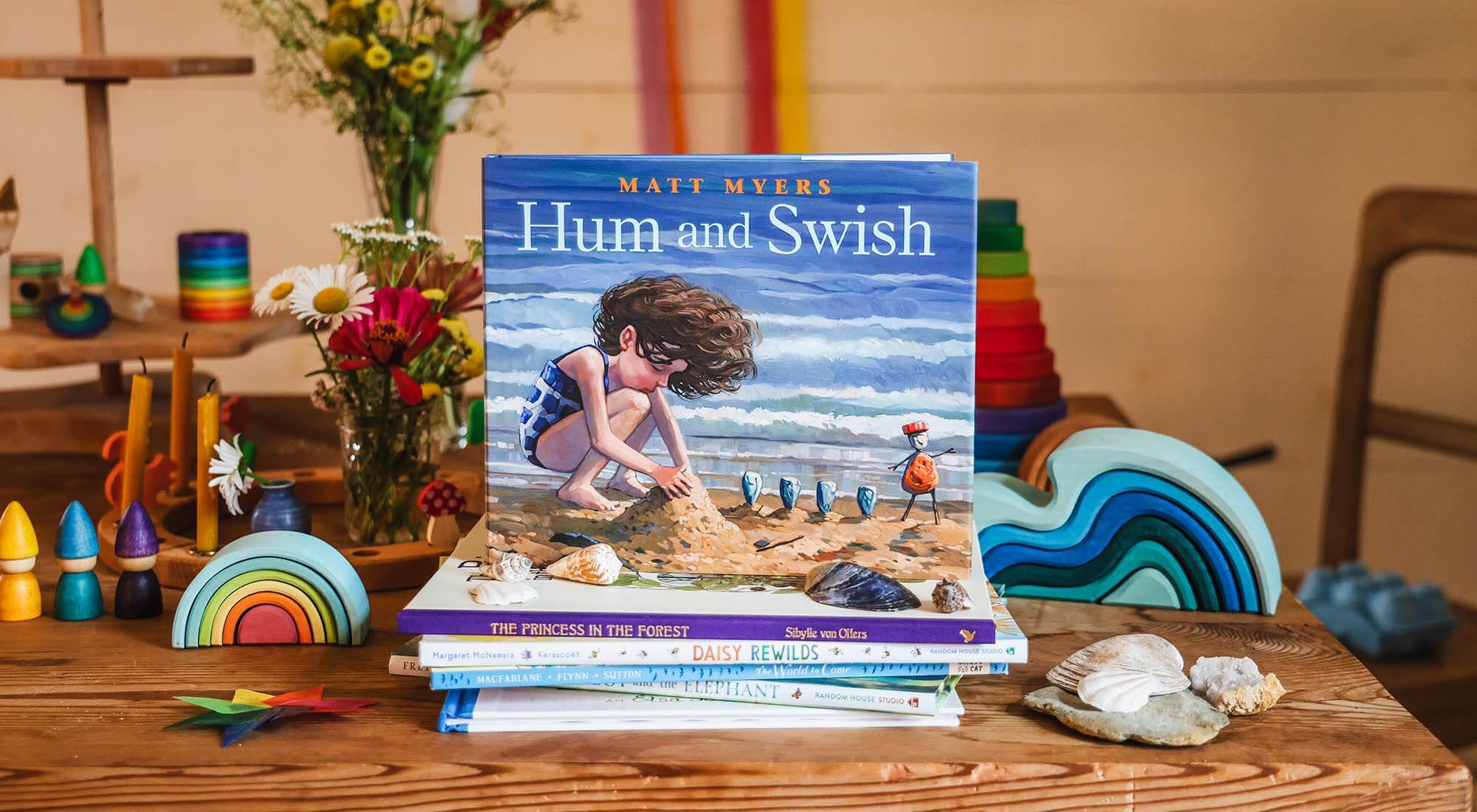 Hum and Swish book stack.