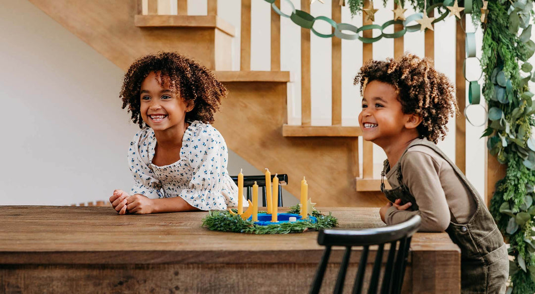 2 kids using the Celebration Ring from Bella Luna Toys.