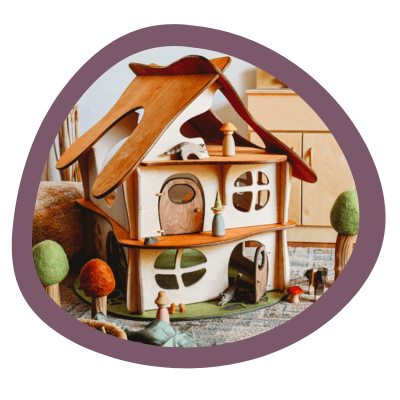 A Waldorf dollhouse in a play room.