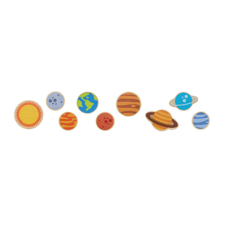 Wooden planet pieces in PlanToys - Land The Planet Game