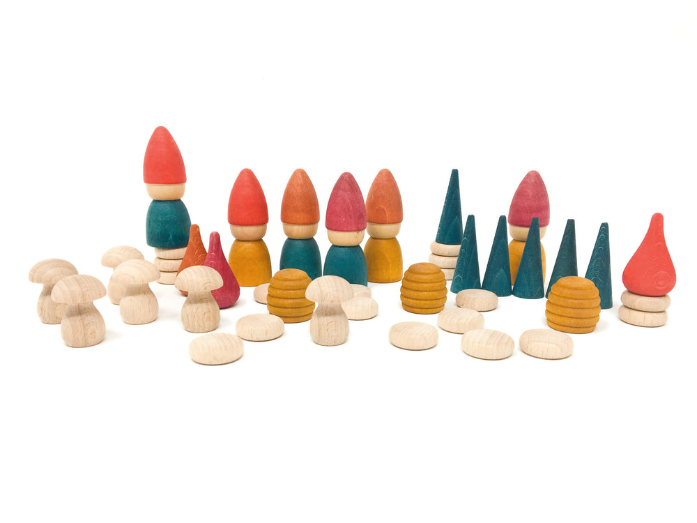 Grapat Nins Tomten Play Set with 6 hand-painted wooden figures, coins, cones, mushrooms, honeycombs, and fire pieces arranged for small-world play - Bella Luna Toys