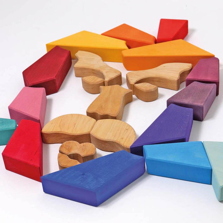 Colorful wooden blocks on a white background.