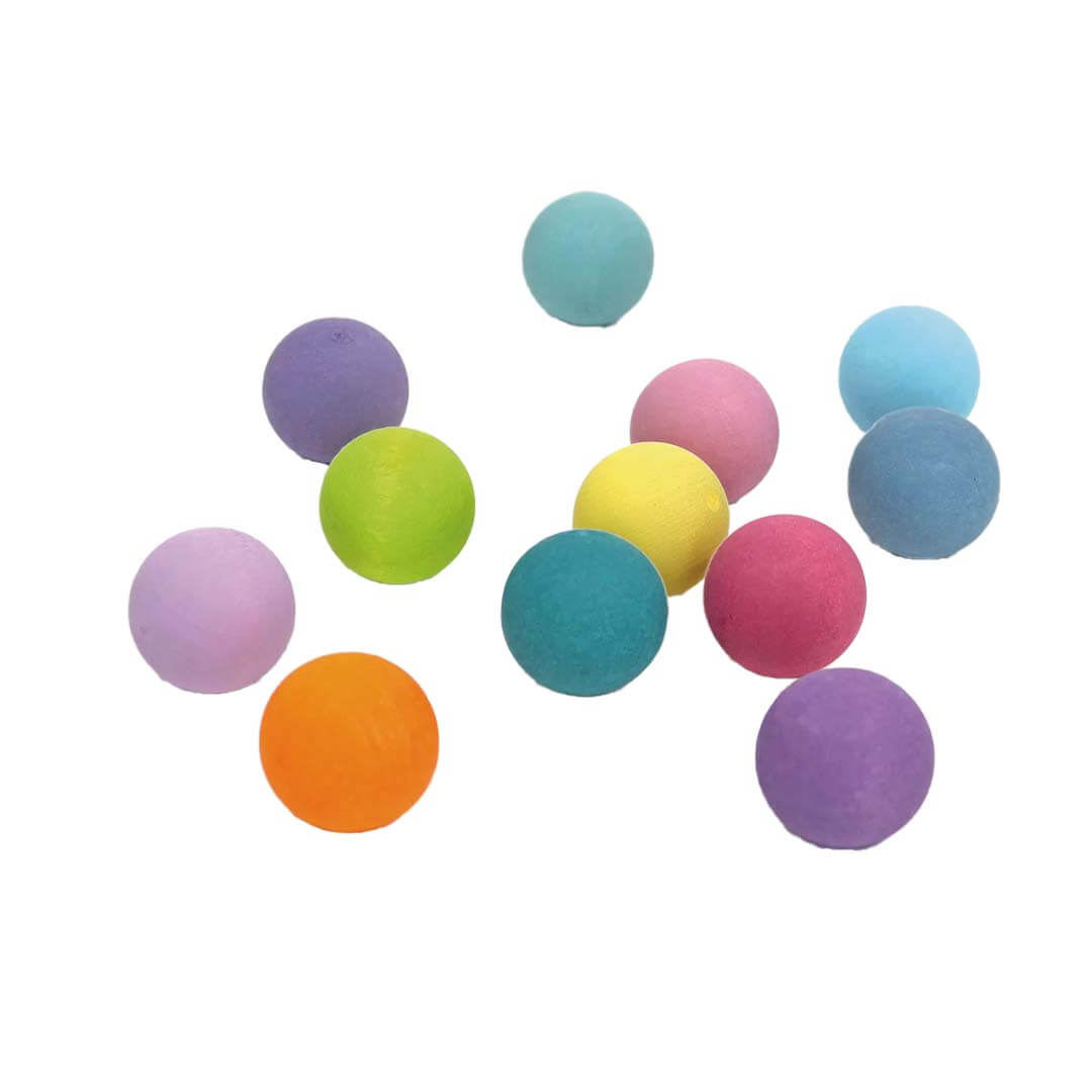 Colorful wooden balls on a white background.