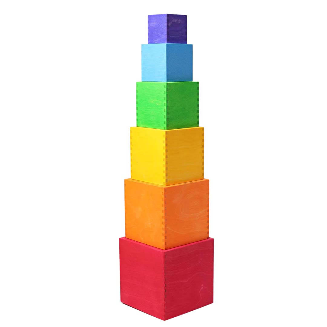 Stack of colorful square blocks on a white background.