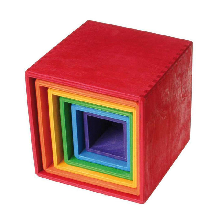Stack of colorful square blocks with a red outer block.
