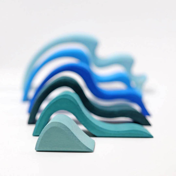 Blue wave shaped blocks on a white background.