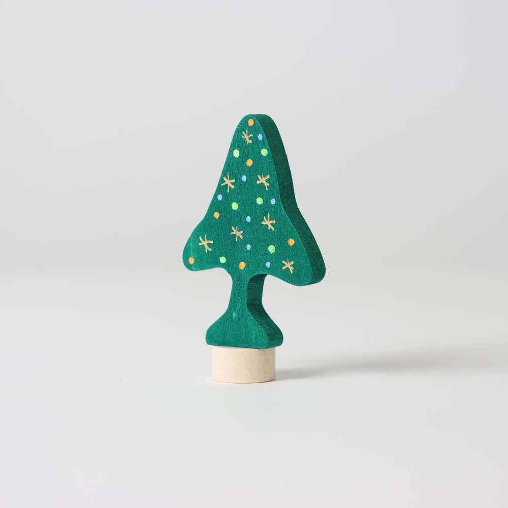 Green wooden Christmas tree ornament with gold stars on a white background