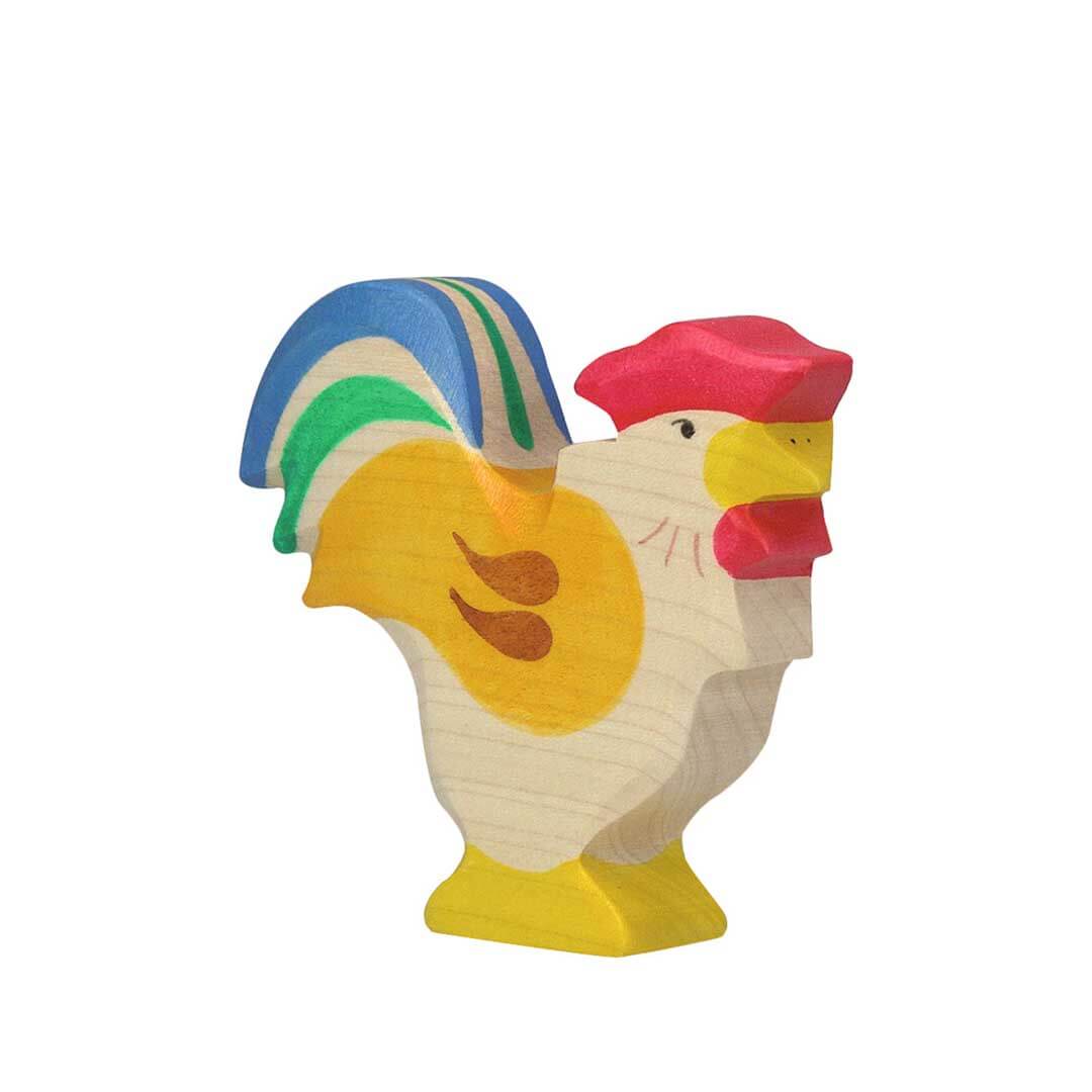 A handcrafted wooden rooster figurine with hand-painted colors including a yellow body, blue and green tail feathers, a red comb, and a yellow beak, isolated on a white background.