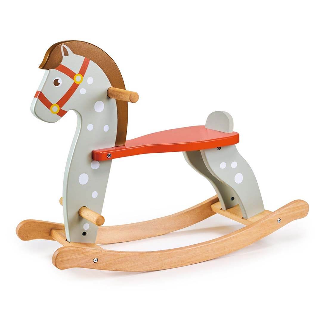 Wooden rocking horse with a white body, brown mane, and red saddle on a white background