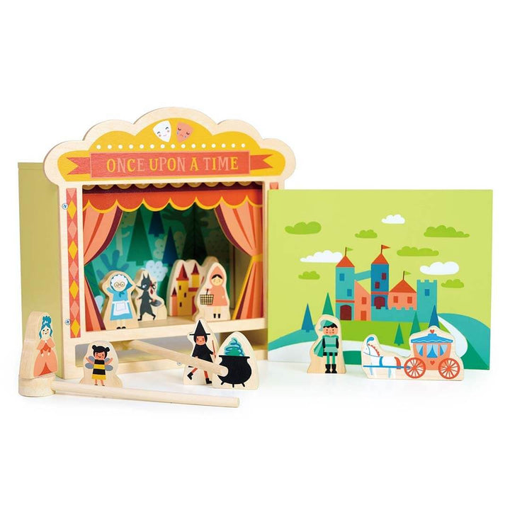 Puppet theater with puppets and a scenic backdrop on a white background