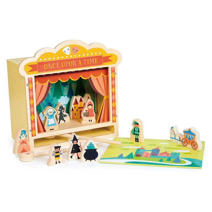 Wooden puppet theater set with puppets and stage on a white background