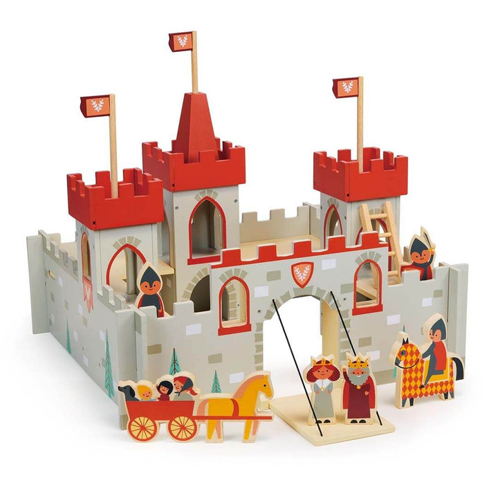 Wooden toy castle with red towers and various figures on a white background
