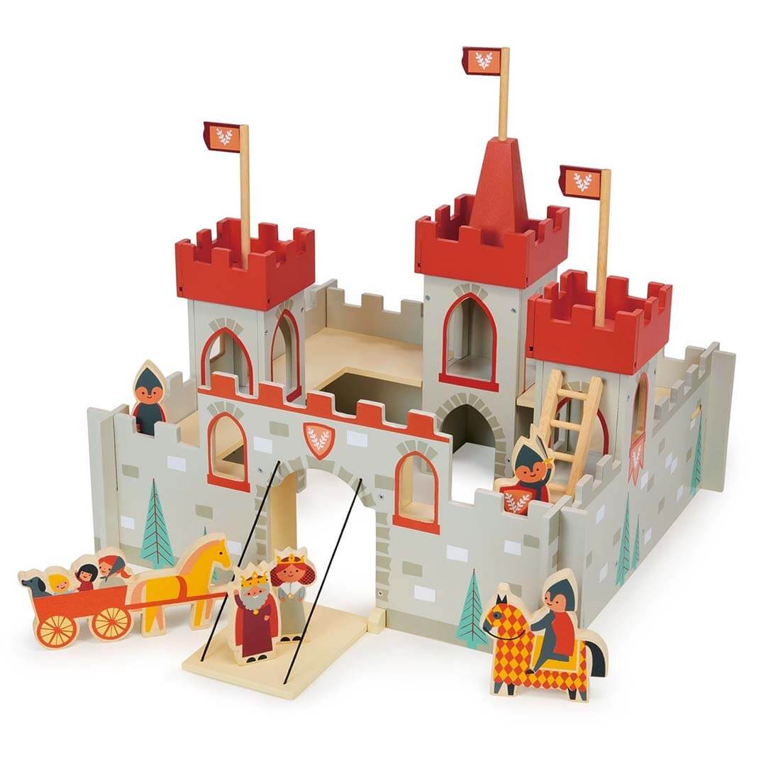 Toy castle with red towers and knights on a white background