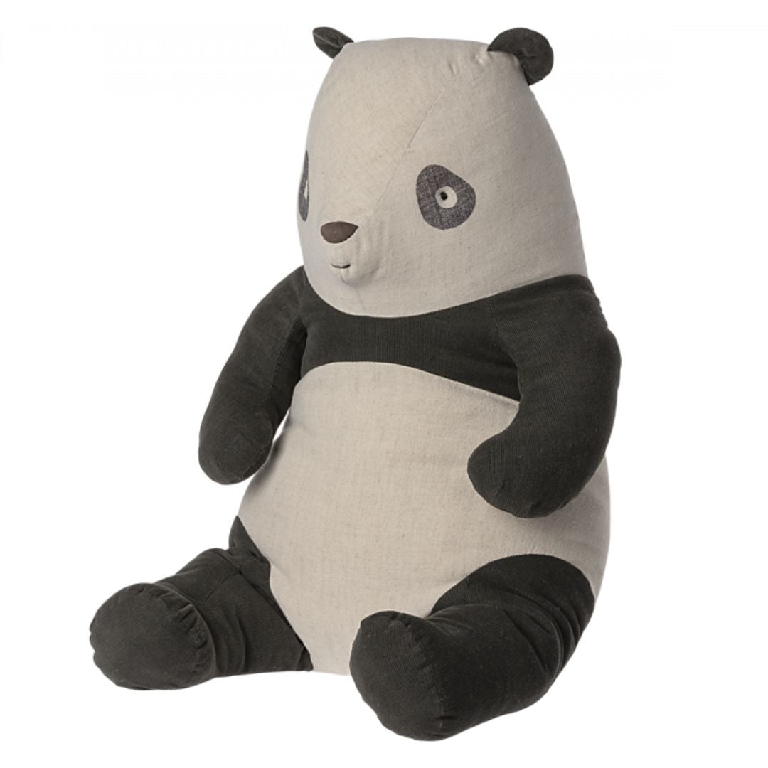 A large black and white Maileg panda stuffed animal.