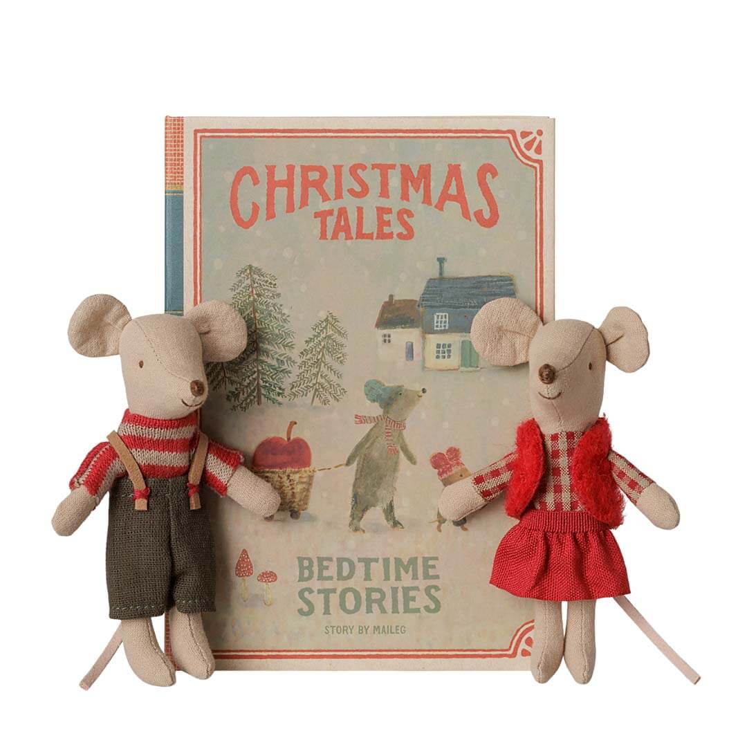 A children's storybook themed toy 'Christmas Tales: Bedtime Stories' displayed upright between two plush toy mice dressed in holiday clothing, on a clean white background.