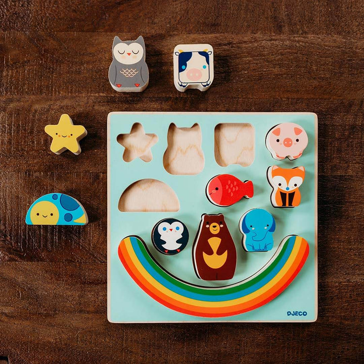 Puzz & Boom Animal Rainbow Wooden Puzzle on a wooden table.