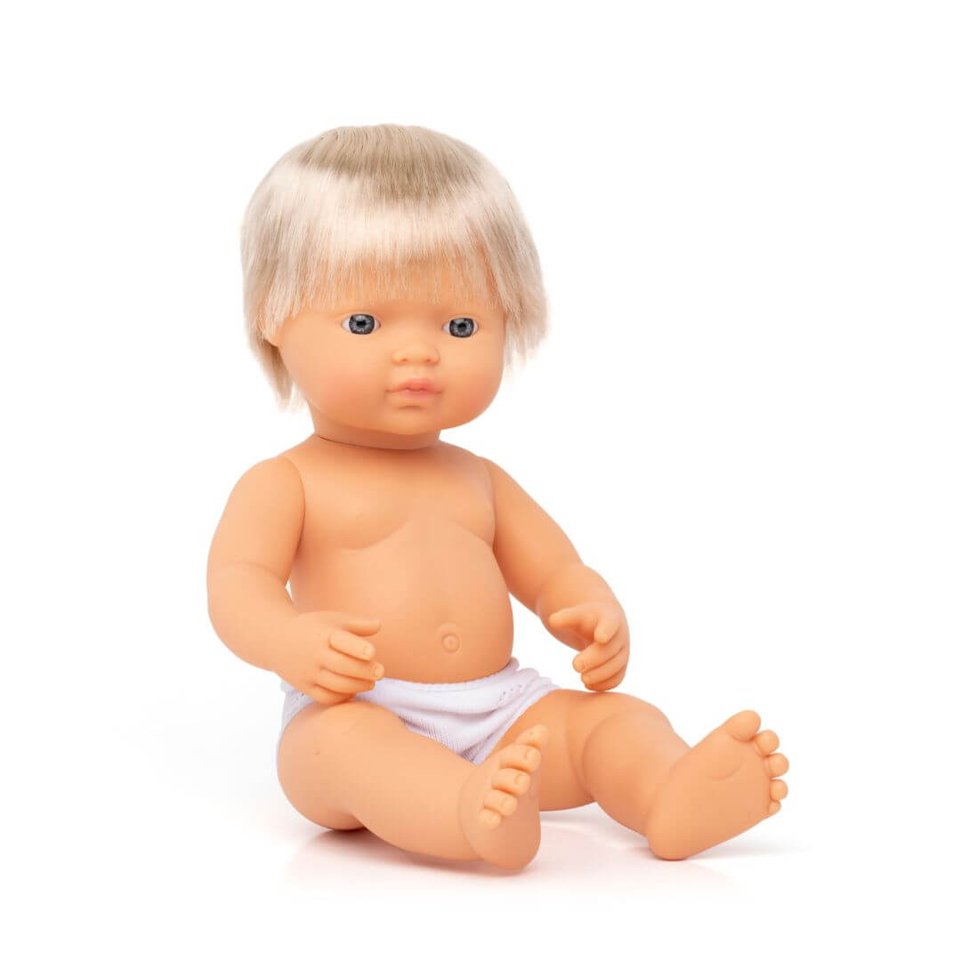 A  Miniland 14-inch Realistic Montessori Doll –White Boy with blonde hair, anatomically correct and crafted from soft, high-quality vinyl for inclusive, educational play.