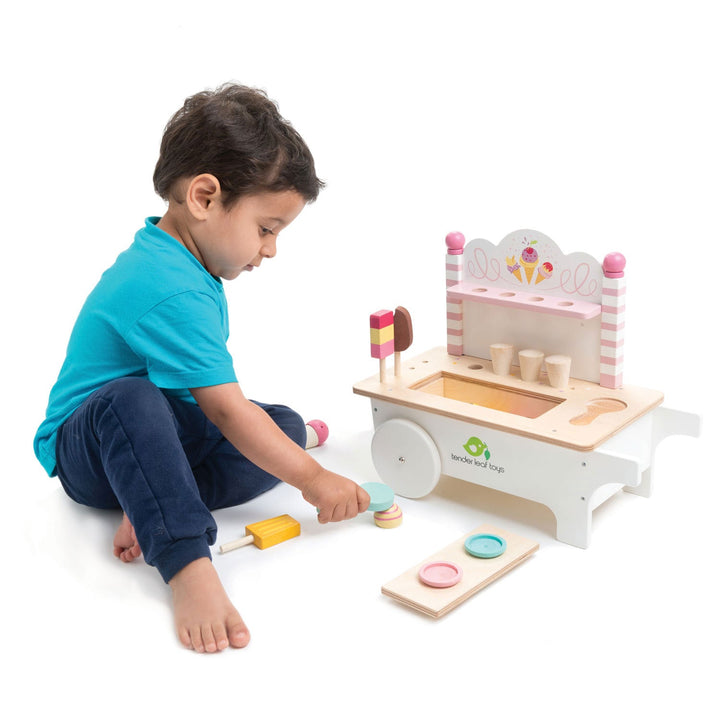 Child playing with Tender Leaf Toys Wooden Ice Cream Cart Play Set - Bella Luna Toys