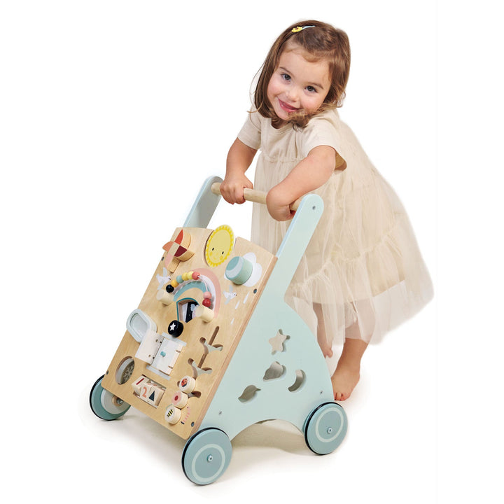 Child standing with Tender Leaf Toys - Wooden Sunshine Baby Activity Walker - Bella Luna Toys