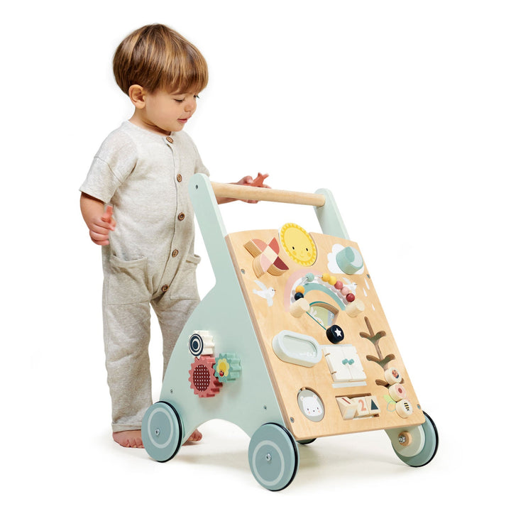 Child walking with Tender Leaf Toys - Wooden Sunshine Baby Activity Walker - Bella Luna Toys