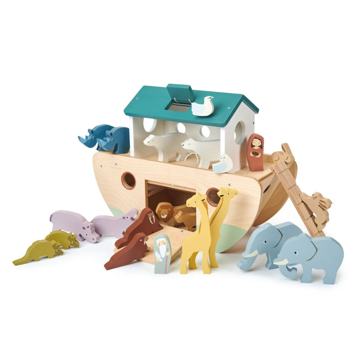 Tender Leaf Toys Wooden Noahs Ark with an assortment of wooden animal figures.