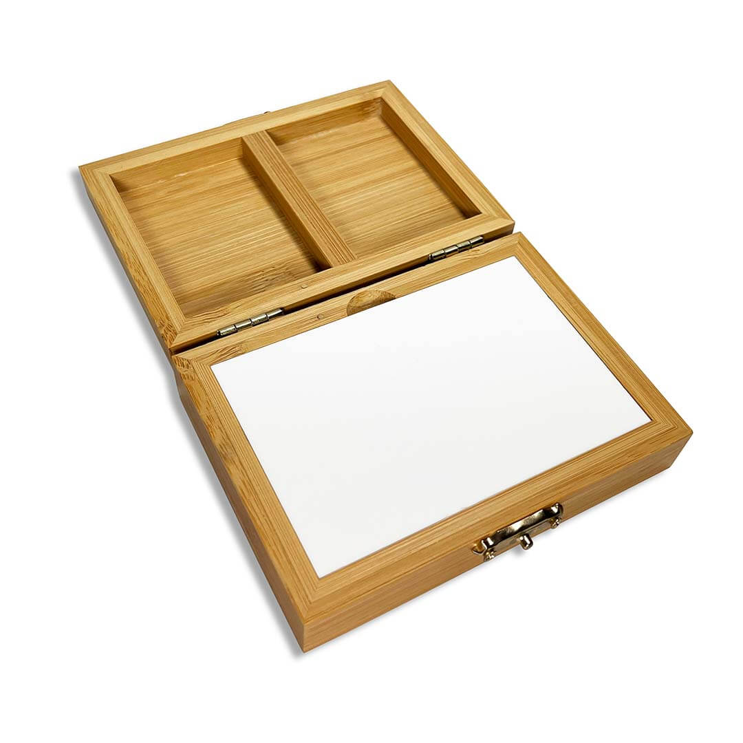 An open rectangular bamboo box with a hinged lid, featuring two interior compartments and a white insert or panel on the front, shown on a clean white background.