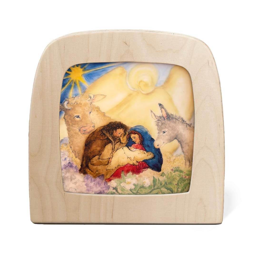 Night Light Transparency - Layered Light: An Advent Story with a painted scene of the Nativity, featuring Mary, Joseph, and baby Jesus.