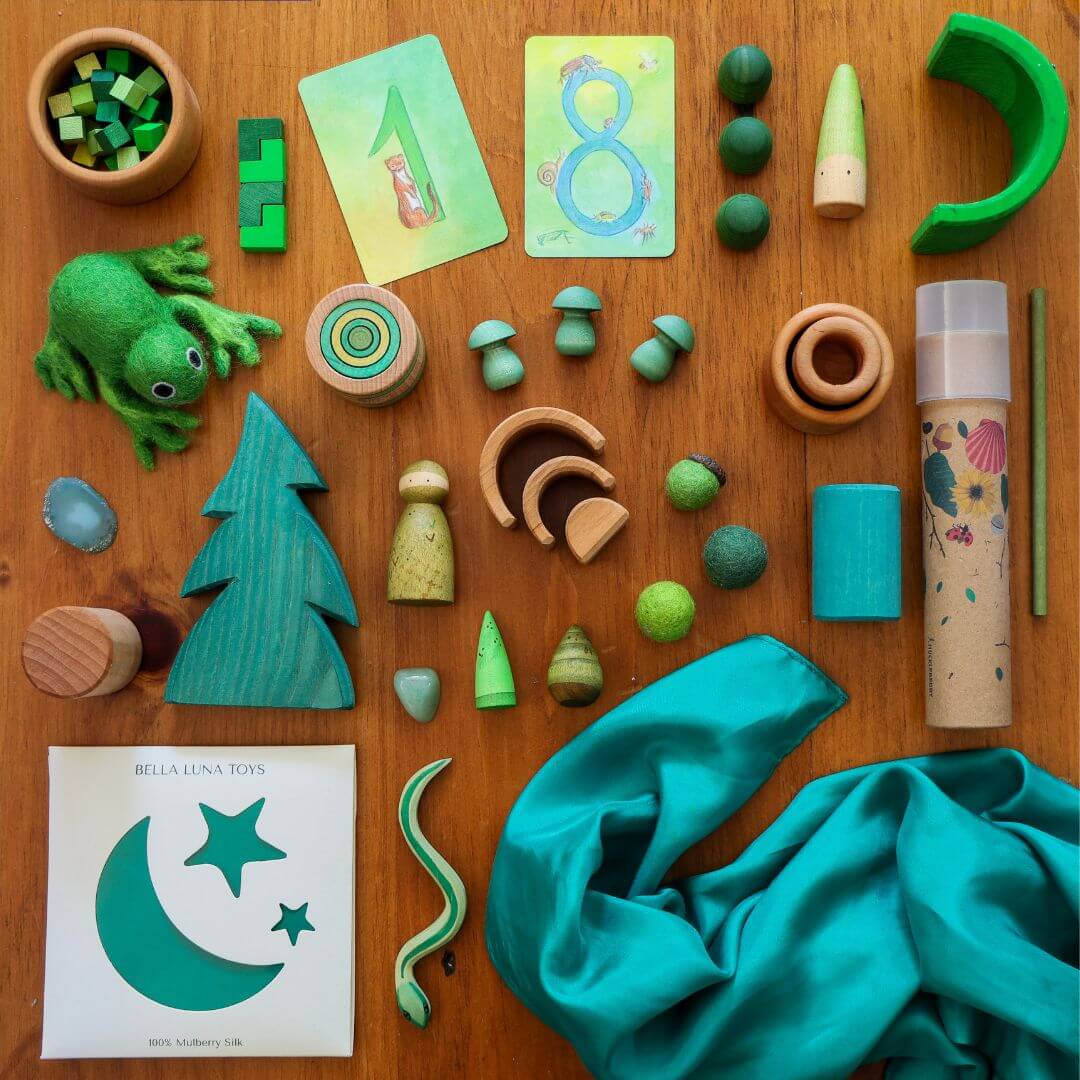 Bella Luna Toys Green Play Silk with a collection of other green items.