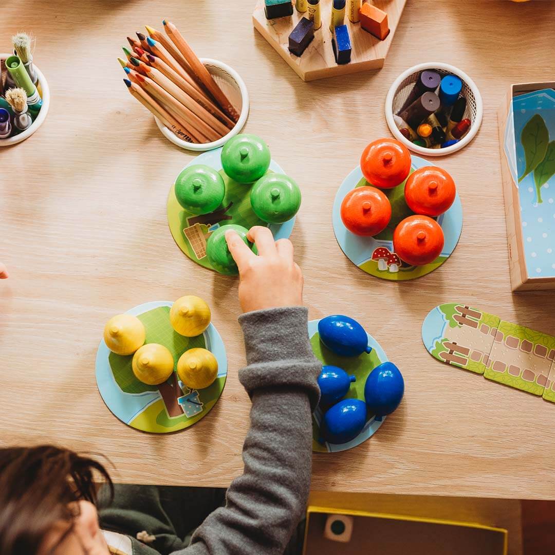 A game for kids on a wooden table.