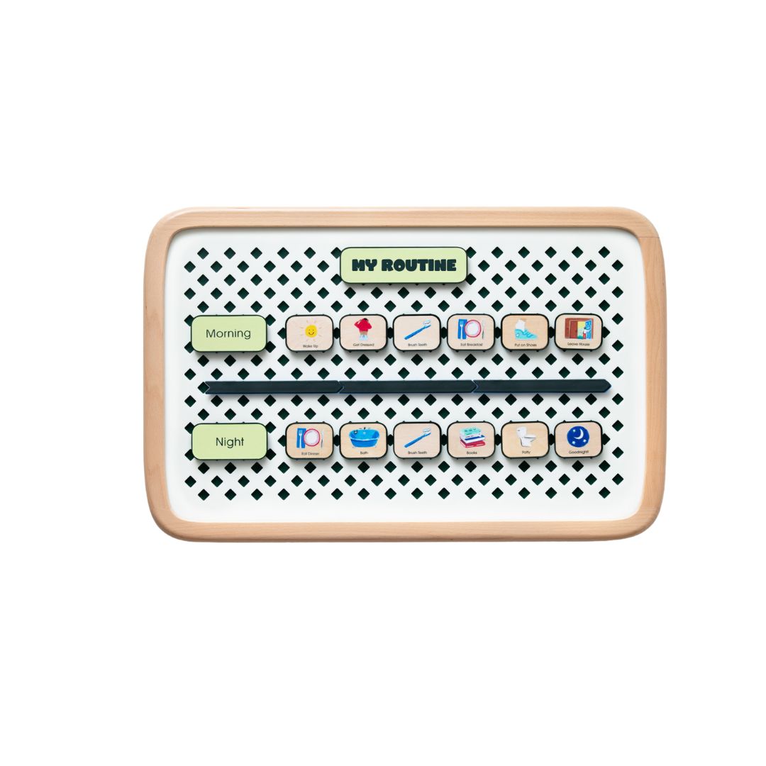 Small Charmspring visual routine board displaying morning and night picture tiles arranged on a patterned backing, shown on a white background. Bella Luna Toys