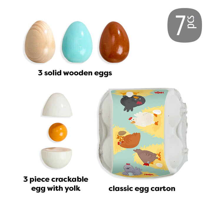 Creative Play – Wooden Eggs Play Food Set of 3 wooden eggs and a crackable egg with yolk, including packaging, on a white background.