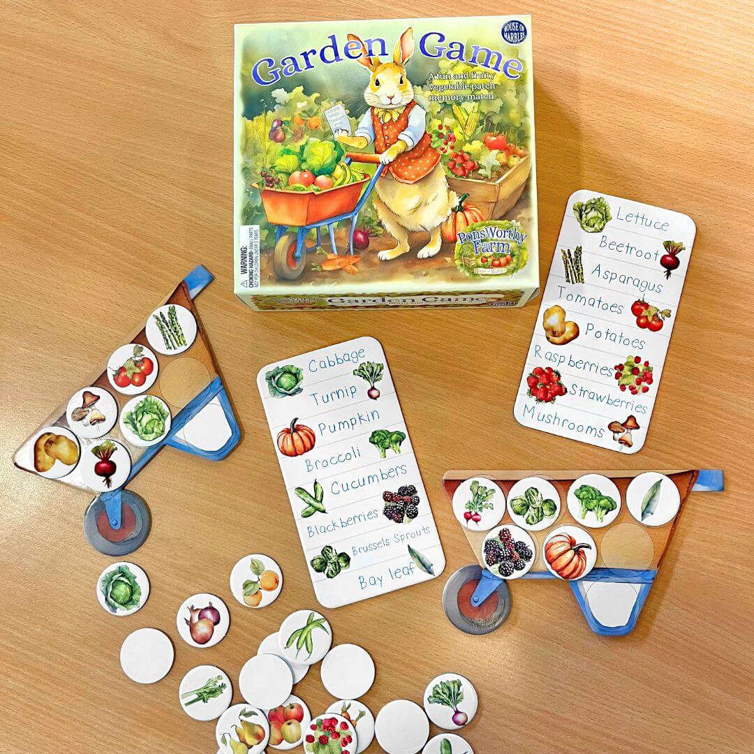 Garden Game with cards and markers on a wooden surface