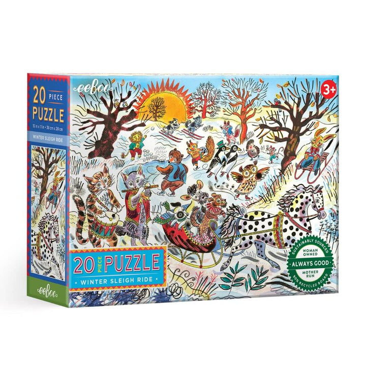 The box of eeBoo's Winter Sleigh Ride 20-piece puzzle illustrated by Emily Sutton with animals skiing and sledding in a snowy landscape – Bella Luna Toys.