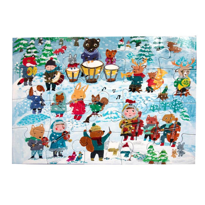 The assembled eeBoo Winter Carol 20-piece puzzle illustrated by Yumi Kitagishi with animals and people playing instruments in a winter concert scene – Bella Luna Toys.