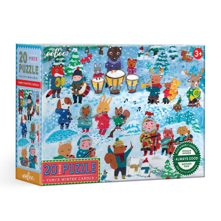 The box of the eeBoo Winter Carol 20-piece puzzle illustrated by Yumi Kitagishi with animals and people playing instruments in a winter concert scene – Bella Luna Toys.