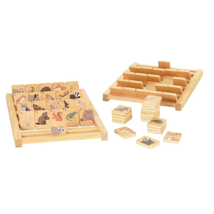 Wooden Who Am I? guessing game by Egmont, featuring two wooden boards with flip-up tiles depicting animals, along with illustrated animal pieces.