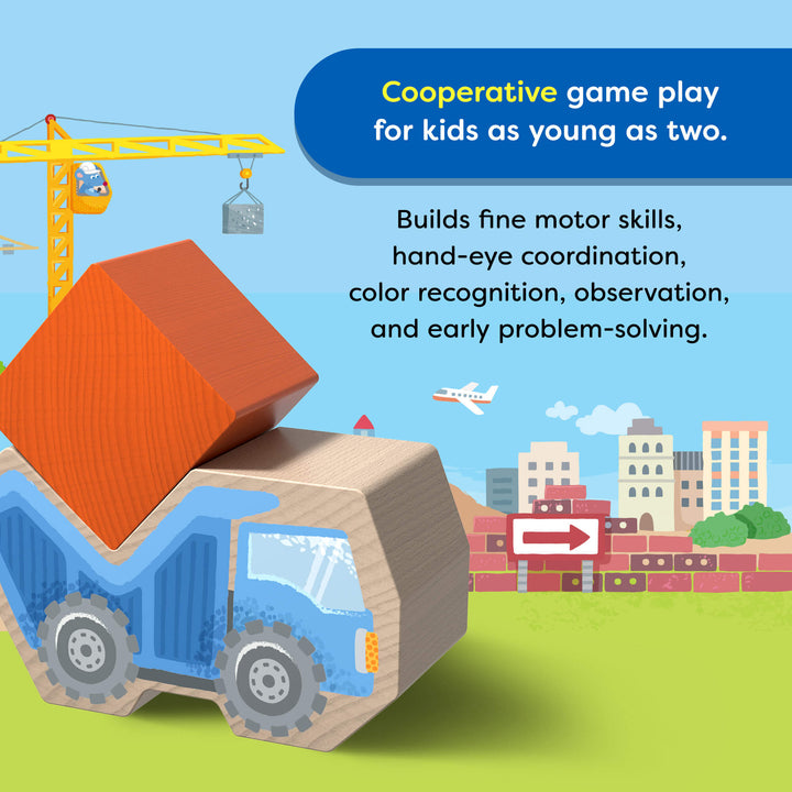 Wooden toy truck from the game My Very First Games - Block by Block. text reads "Cooperative game play for kids as young as two. Builds fine motor skills, hand-eye coordination, color recognition, observation, and early problem-solving."