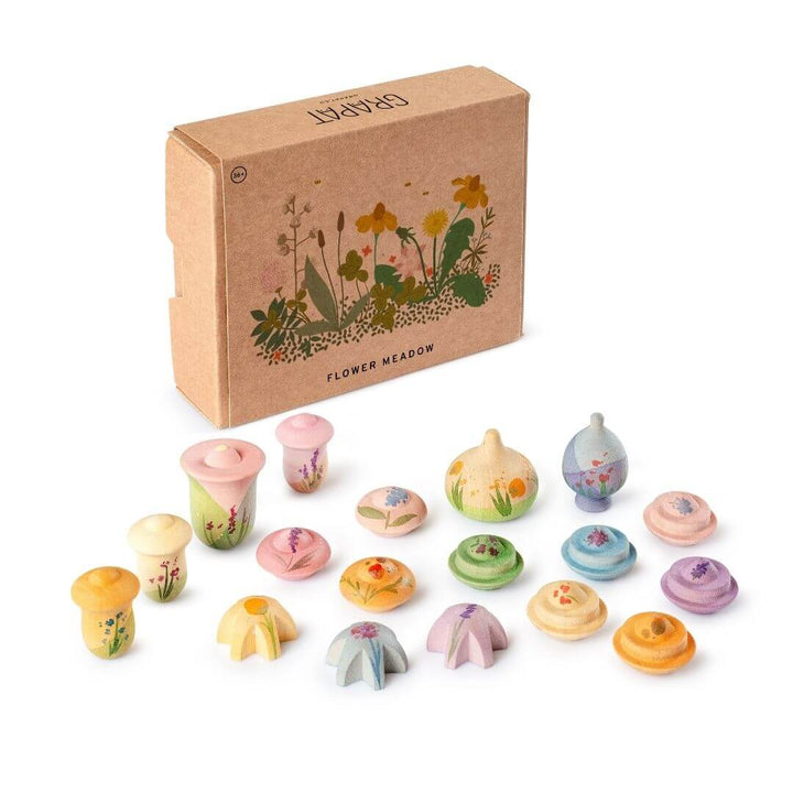 Grapat Flower Meadow wooden play set with 18 hand-painted wooden flower pieces in soft pastel colors, displayed with illustrated box packaging - Bella Luna Toys