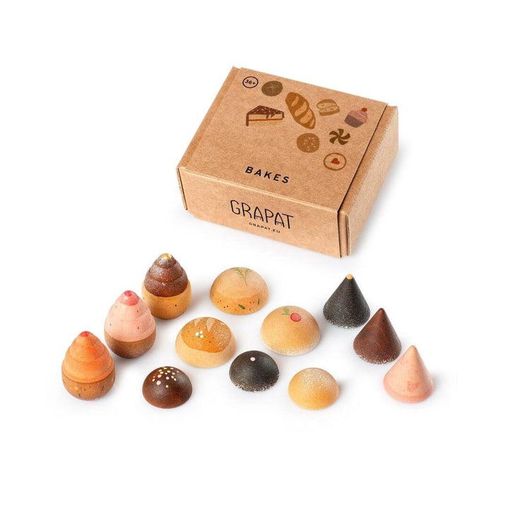 Grapat wooden breads and cookies play set with 12 hand-painted wooden bakery pieces in warm natural tones displayed with illustrated box packaging - Bella Luna Toys