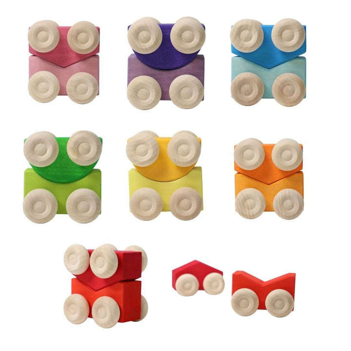 Set of 7 colorful wooden stacking cars by Grimm’s, handcrafted in assorted rainbow hues for open-ended play and building fun - Bella Luna Toys